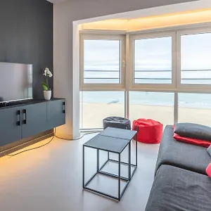 https://luxe-appartement-eliza-frontaal-zeezicht-in-mariakerke.hotelsghent.com